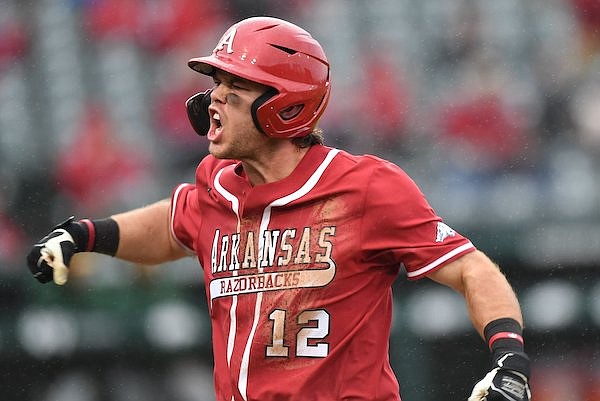 Arkansas catcher Michael Turner celebrates Saturday, March 5, 2022, after hitting a two-run home run during the seventh inning of the Razorbacks' 4-2 win over Southeastern Louisiana at Baum-Walker Stadium in Fayetteville.