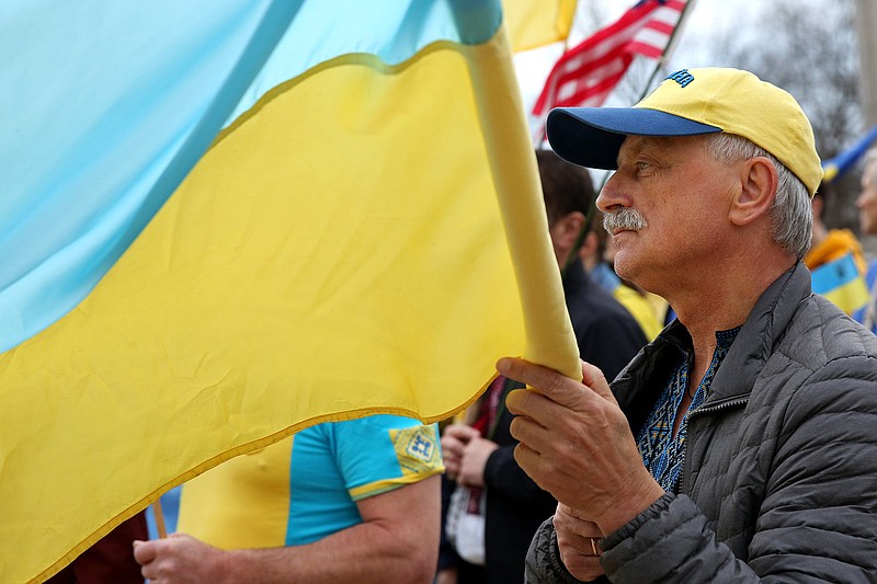 Ukrainian citizen Stepan Melnyk attends a rally in support of his country Saturday on the steps of the state Capitol in Little Rock. More photos at arkansasonline.com/306rally/.
(Arkansas Democrat-Gazette/Colin Murphey)