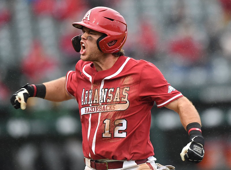 Arkansas catcher Michael Turner celebrates Saturday, March 5, 2022, after hitting a two-run home run during the seventh inning of the Razorbacks? 4-2 win over Southeastern Louisiana at Baum-Walker Stadium in Fayetteville. Visit nwaonline.com/220306Daily/ for today's photo gallery..(NWA Democrat-Gazette/Andy Shupe)