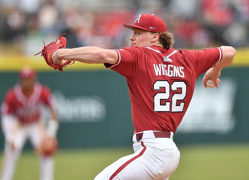 Arkansas stater Jaxon Wiggins delivers to the plate Saturday, March 5, 2022, during the third inning in the second game against Southeastern Louisiana at Baum-Walker Stadium in Fayetteville. Visit nwaonline.com/220306Daily/ for today's photo gallery..(NWA Democrat-Gazette/Andy Shupe)