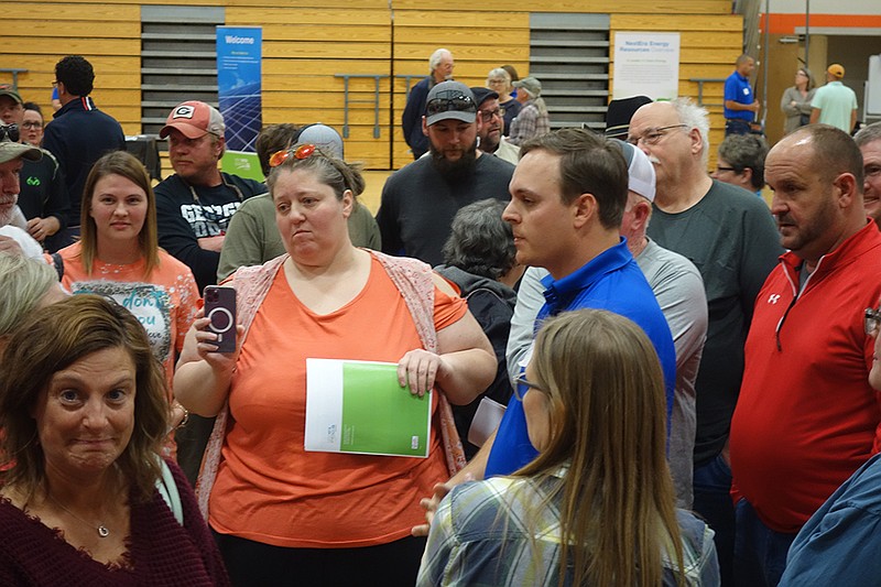 Bo McGee, the NextEra Energy developer for a potential solar project in the New Bloomfield area, fields questions from Callaway County residents Tuesday on the project at an open house at New Bloomfield High School. (Michael Shine/FULTON SUN)