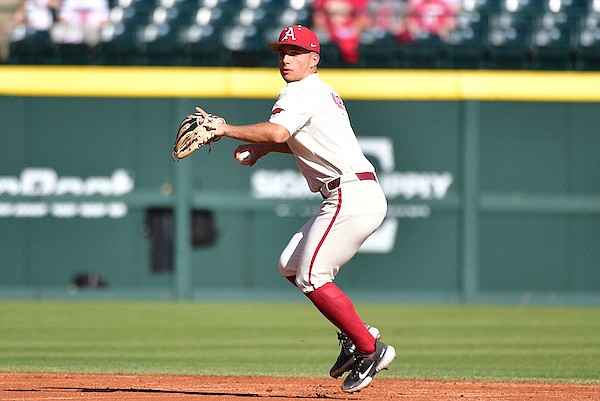 Arkansas shortstop Robert Moore prepares to throw during a game against Grambling State on Wednesday, March 16, 2022, in Fayetteville.