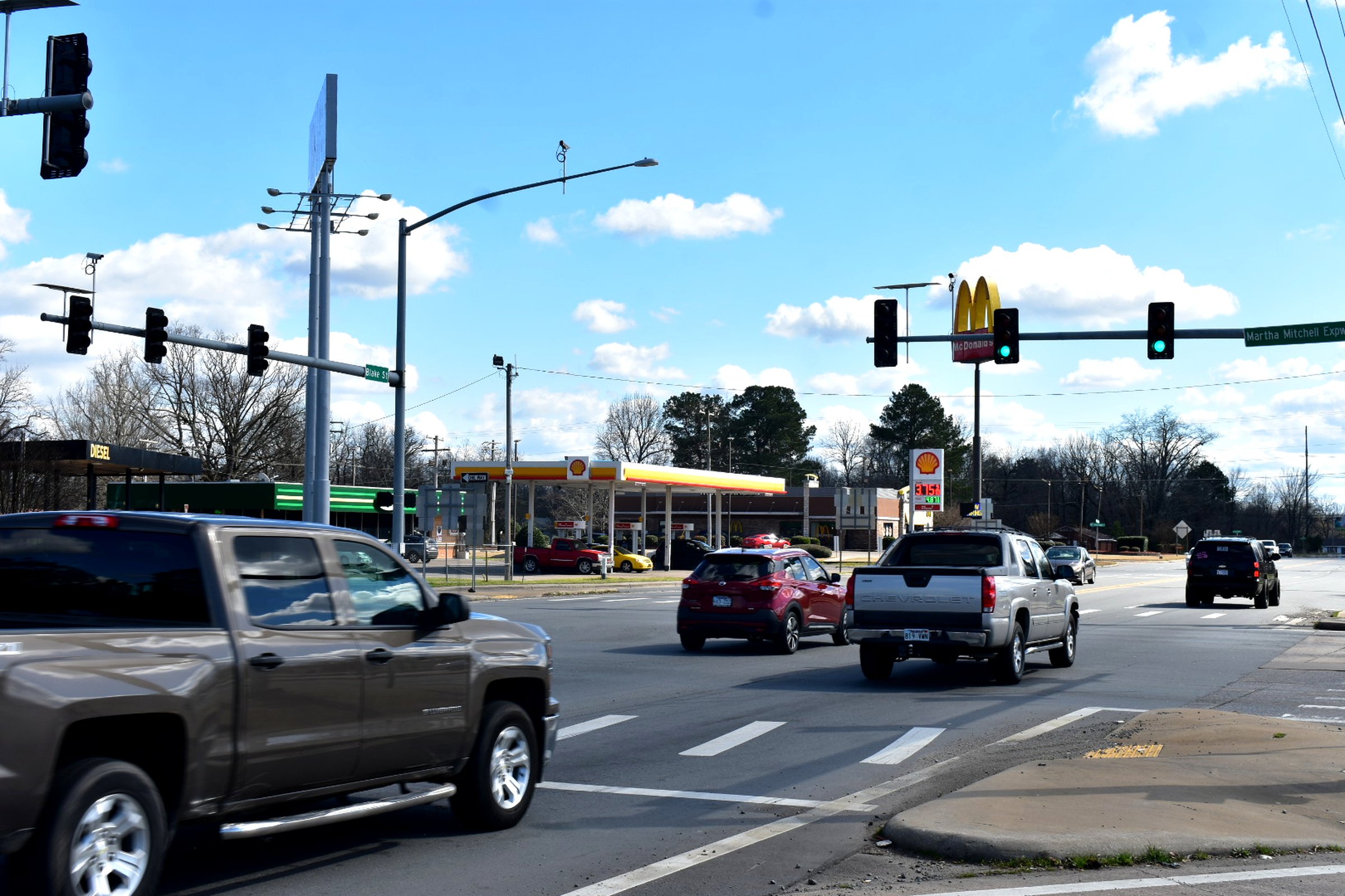 Gunfire at intersection leaves woman injured