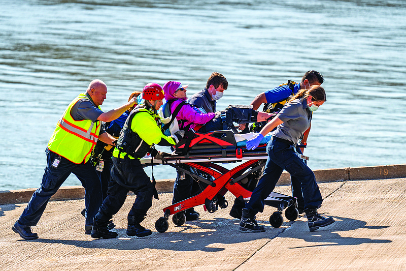 Cole, Callaway and Jefferson City emergency services pulled two people from the Missouri River on Wednesday March, 16, 2022. (Ethan Weston/News Tribune photo)
