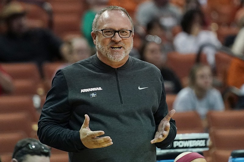 Arkansas head coach Mike Neighbors reacts to a play during the first half of a college basketball game against Utah in the first round of the NCAA women's tournament, Friday, March 18, 2022, in Austin, Texas. (AP Photo/Eric Gay)