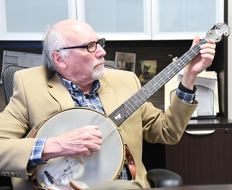 Charlie Moore, founder of the Arkansas Highlands Folk Project, performs on a banjo. - Photo by Tanner Newton of The Sentinel-Record