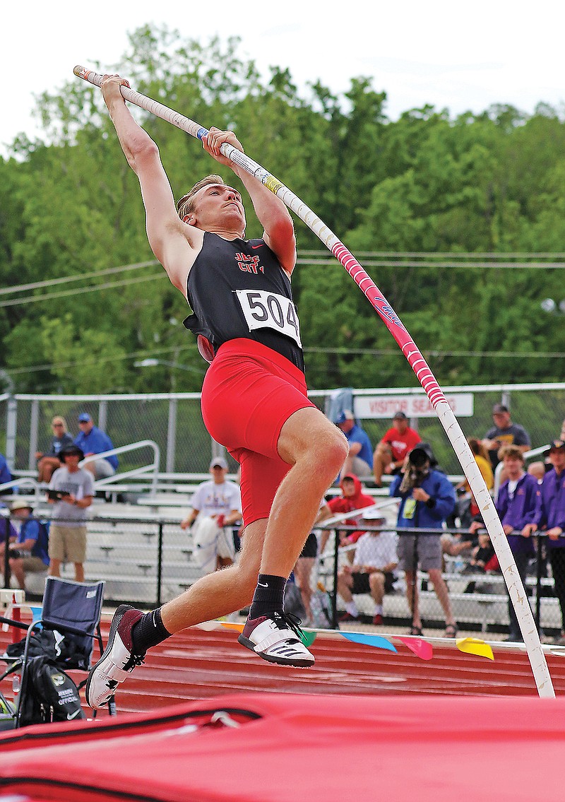 Parker Gourley of Jefferson City lifts himself off the ground during the pole vault in the Class 5 state track and field championships last year at Adkins Stadium. (Jason Strickland/News Tribune)