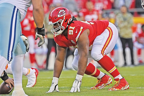 Kansas City Chiefs defensive tackle Derrick Nnadi (91) walks back to the  locker room before an NFL football game against the Los Angeles Chargers,  Sunday, Nov. 20, 2022, in Inglewood, Calif. (AP