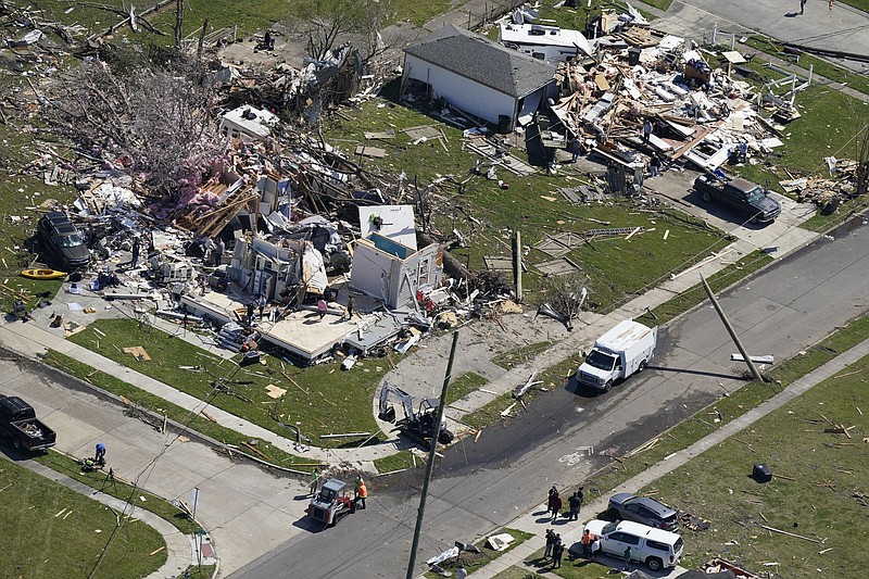Debris from destroyed homes litters the area Wednesday after a tornado swept through Arabi, La., the night before.
(AP/Gerald Herbert)
