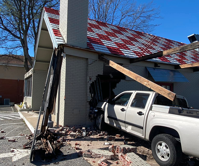 A pickup truck crashed into the side of the Hubcap Burger Company restaurant Wednesday afternoon. (Courtesy of Erin Griffin)