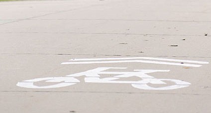Paint markings designate a bicycle trail in Jefferson City. (News Tribune file photo)