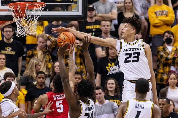 Missouri's Trevon Brazile, right, blocks the shot of Georgia's Christian Wright during the second half of an NCAA college basketball game Saturday, March 5, 2022, in Columbia, Mo. Missouri won 79-69. (AP Photo/L.G. Patterson)