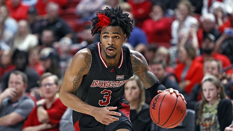 Jonesboro native Desi Sills (shown), who spent two seasons at the University of Arkansas before transferring to Arkansas State where he played this season, announced Thursday that he was re-entering the transfer portal. Sills started 27 of the 28 games at ASU this season, averaging nearly 30 minutes, 12.6 points, 3.6 rebounds per game.
(AP/Brad Tollefson)