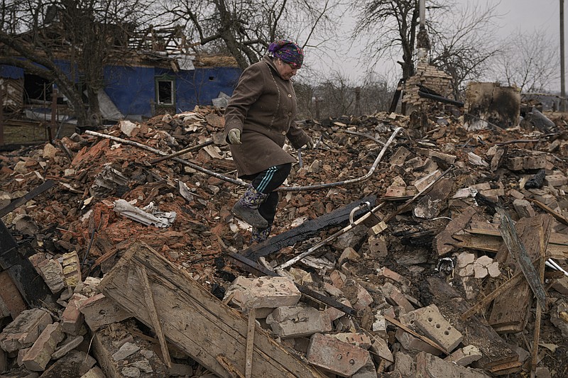 Mariya, a resident of Yasnohorodka, Ukraine, looks for belongings Wednesday in the rubble of her house after it was destroyed during fighting between Russian and Ukrainian forces in the village that sits on the outskirts of Kyiv.
(AP/Vadim Ghirda)