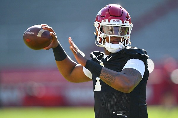 Arkansas quarterback KJ Jefferson passes the ball Tuesday, March 15, 2022, during practice at Razorback Stadium in Fayetteville. Visit nwaonline.com/220316Daily/ for the photo gallery.