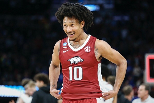 Arkansas forward Jaylin Williams reacts on Thursday, March 24, 2022, at the end of the Sweet 16 round of the 2022 NCAA Division I Men's Basketball Championship at Chase Center in San Francisco, Calif. Check out nwaonline.com/220325Daily/ and nwadg.com/photos for the photo gallery.