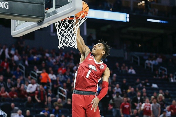 Arkansas guard JD Notae dunks on Thursday, March 24, 2021 during the first half of the Sweet 16 round of the 2022 NCAA Division 1 Men's Basketball Championship at Chase Center in San Francisco, Calif. Check out nwaonline.com/220325Daily/ and nwadg.com/photos for the photo gallery.