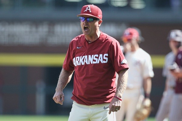 Arkansas coach Dave Van Horn reacts to an umpire during a game against Mississippi State on Sunday, April 3, 2022, in Fayetteville.