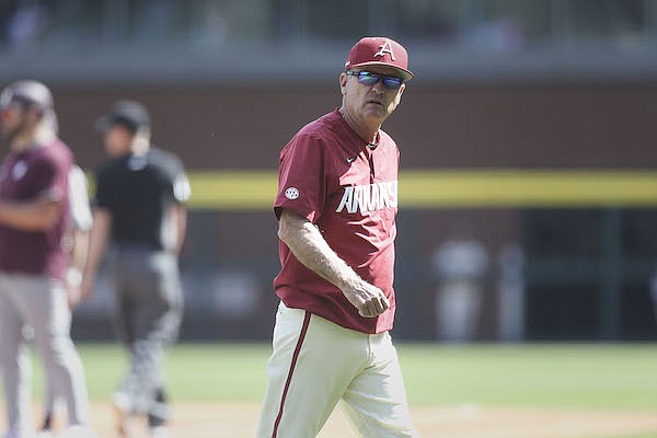 Arkansas coach Dave Van Horn walks toward the dugout during a game against Mississippi State on Sunday, April 3, 2022, in Fayetteville. Arkansas coach Dave Van Horn walks toward the dugout during a game against Mississippi State on Sunday, April 3, 2022, in Fayetteville.