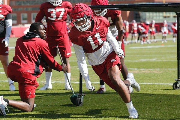 Mataio Soli participates in an agility drill during Arkansas spring football practice on Thursday, April 1, 2021, at the practice field on the campus in Fayetteville.