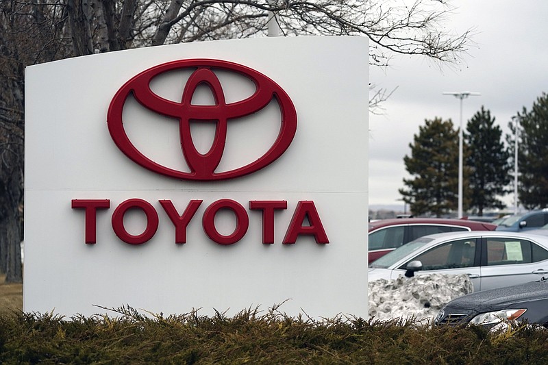 Toyota’s logo adorns a sign outside a Toyota dealership in Lakewood, Colo.
(AP)