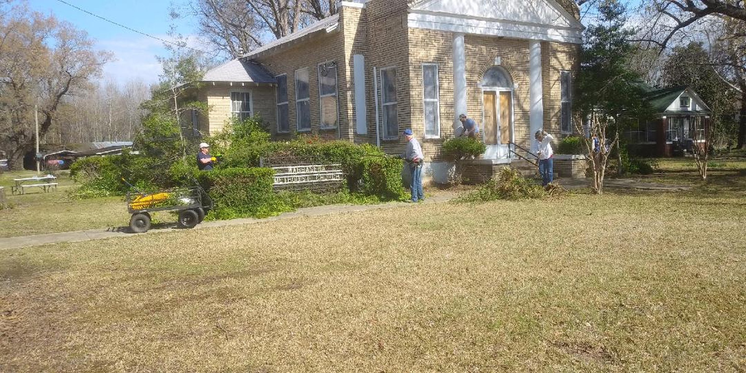 Helpers pitch in at site of church