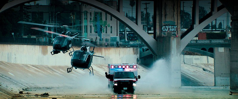 Downtown Los Angeles and the infamous inches deep Los Angeles River (also known as the Rio Porciuncula) provide the setting for Michael Bay’s latest hyperkinetic action film “Ambulance.