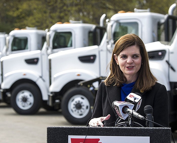 Marie Holder, a member of the Arkansas Highway Commission, addresses the media during a news conference in Little Rock on  to announce the purchase of seven new lower-emission trucks.
(Arkansas Democrat-Gazette/Stephen Swofford)