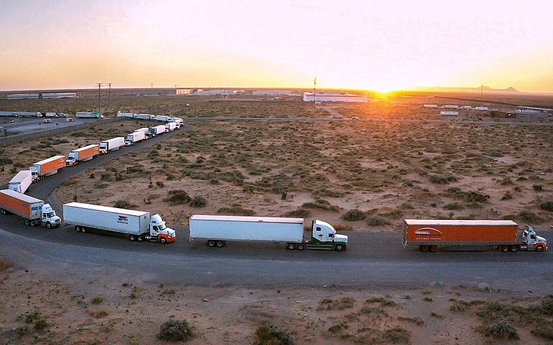 Truckers block the entrance to the Santa Teresa Port of Entry near Ciudad Juarez, Chihuahua, on Tuesday. The truckers’ protest at the border with New Mexico is one of several after Texas Gov. Greg Abbott ordered extra inspections by state troopers. “If you want relief from the clogged border, you need to call President Biden,” Abbott said Wednesday.
(AP/The El Paso Times/Omar Ornelas)