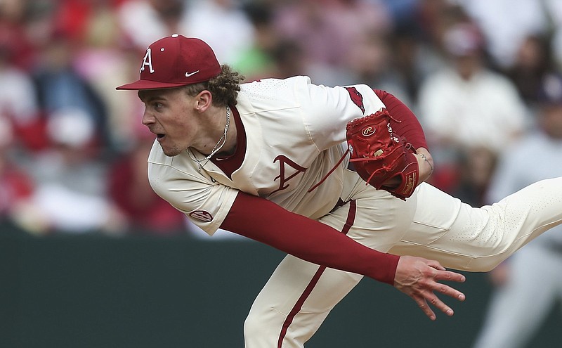 Sophomore right-hander Jaxon Wiggins improved to 5-0 as he went 5 1/3 innings and allowed 9 hits and 2 runs while walking 3 and striking out a career-high 9 in the No. 5 Razorbacks’ 6-2 victory over No. 12 LSU on Saturday at Baum-Walker Stadium in Fayetteville. Arkansas swept the series to win its fifth in a row. More photos available at arkansasonline.com/417lsuua/.
(NWA Democrat-Gazette/Charlie Kaijo)