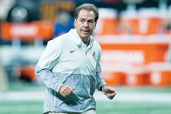 In this Jan. 10 file photo, Alabama coach Nick Saban watches warmups before the CFP title game against Georgia in Indianapolis. (Associated Press)