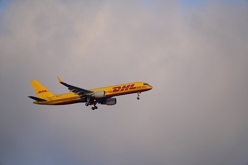 A DHL cargo Boeing 757 approaches for a landing in Lisbon, Spain, earlier this month.
(AP)