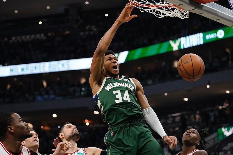 Giannis Antetokounmpo of the Milwaukee Bucks completes a dunk during the Bucks’ victory over the Chicago Bulls in Game 5 of their NBA Eastern Conference playoff series Wednesday night in Milwaukee. Antetokounmpo had 33 points as the Bucks clinched the series 4-1.
(AP/Morry Gash)