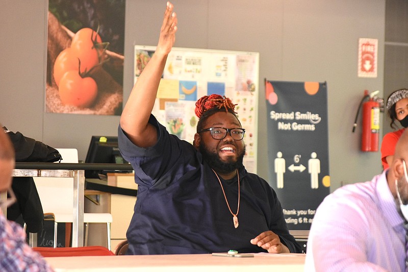 Pine Bluff School District teacher Tavorres Eskew makes comments about ninth-graders moving to middle school campuses during a facilities meeting Tuesday, April 26, 2022, at the school cafeteria. (Pine Bluff Commercial/I.C. Murrell)