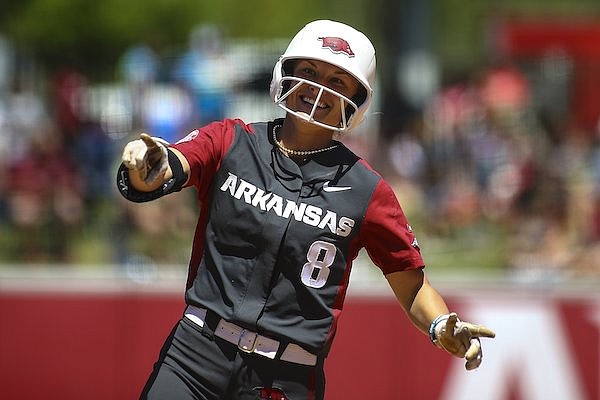 Arkansas' KB Sides runs the bases after hitting a home run during a game against South Carolina on Saturday, April 30, 2022, in Fayetteville.