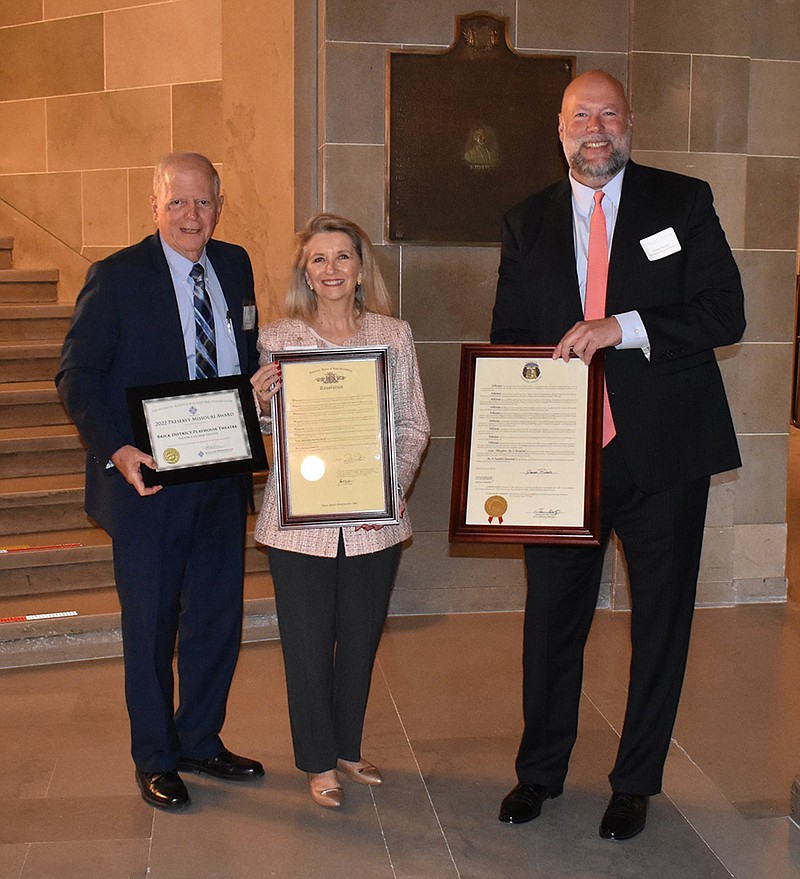 Phil Glenn, Debbie LaRue and Tom Riley accept a Preserve Missouri Award last month for their efforts to restore the Brick District Playhouse Theatre in downtown Fulton. (Submitted)