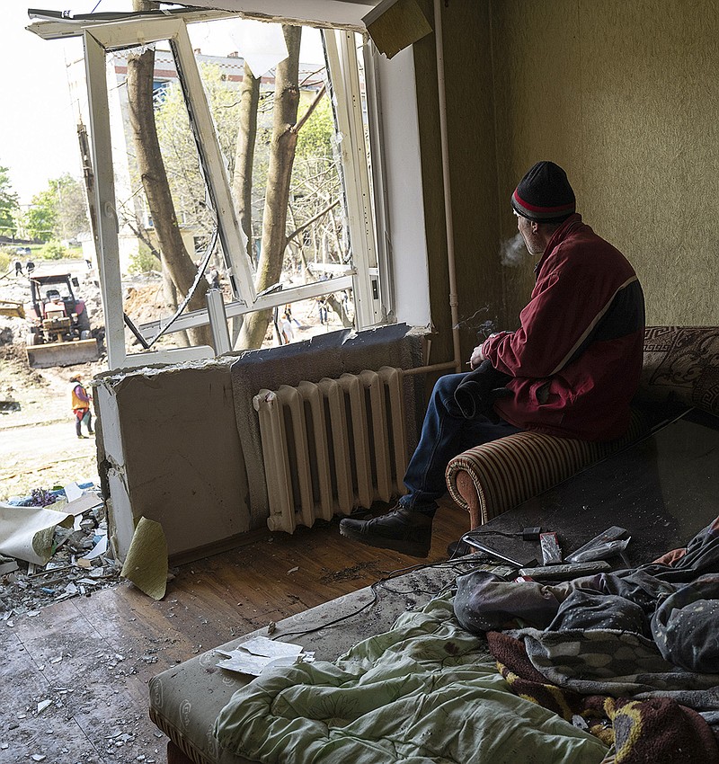 Aleksandr, a resident of Kramatorsk, Ukraine, sits in his damaged home hours after Russian fighter jets launched three airstrikes on the eastern Ukrainian city Thursday morning, injuring at least 26 people, gutting a large apartment complex and destroying a store selling bras and underwear.
(The New York Times/Lynsey Addario)