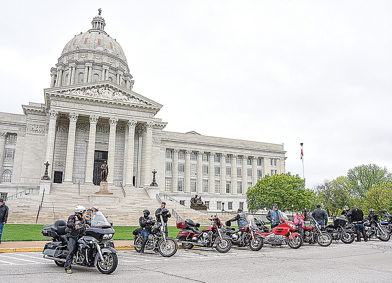 A couple of dozen motorcylists paraded to the Missouri Capitol Wednesday, May 4, 2022, as part of Freedom of the Road Riders Rally and Lobby Day. The group gathered at American Legion Post 5 and left en masse to arrive at the Capitol as one group, after which they gathered inside for the rally and to lobby legislators. (Julie Smith/News Tribune photo)