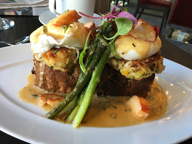 FILE — Seafood Benedict brunch special (crab cakes and lobster in a lobster-Hollandaise sauce over a 3-inch-thick slice of focaccia bread) at Cache. (Arkansas Democrat-Gazette/Eric E. Harrison)