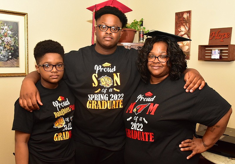 Kristen Hamilton (from left) is inspired by her brother Gerren Alexander Jr.’s and mother Mae Morris’ persistence to graduate from Dollarway High School and the University of Arkansas at Pine Bluff, respectively. 
(Pine Bluff Commercial/I.C. Murrell)