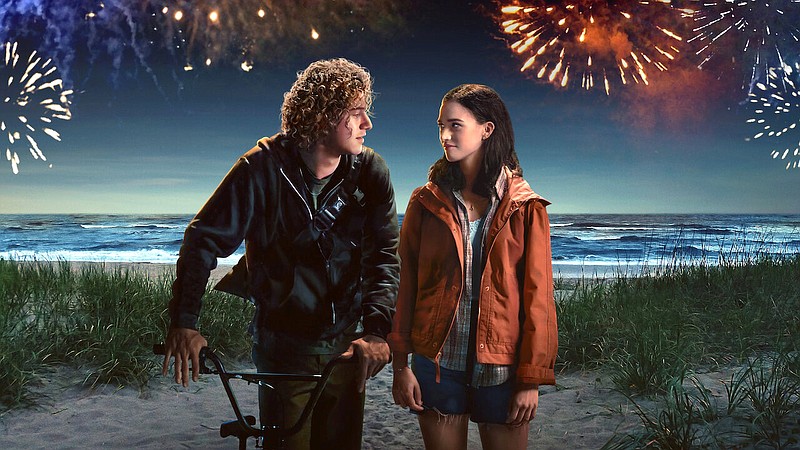 Insomniac beach town teens Eli (Belmont Cameli) and Auden (Emma Pasarow) connect during nocturnal adventures in the Netflix rom-com “Along for the Ride.”