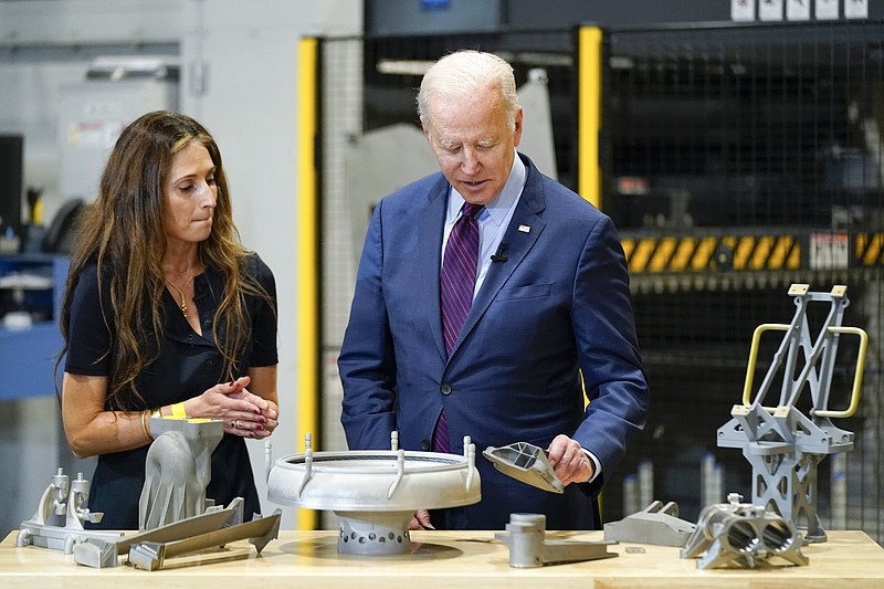President Joe Biden speaks Friday with Joanna Zelaya, chief executive officer of Chicago Precision, during a tour at United Performance Metals in Hamilton, Ohio.
(AP/Andrew Harnik)