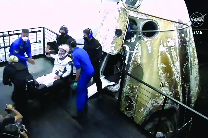 In this video still, the European Space Agency’s Matthias Maurer exits the SpaceX Dragon space capsule after splashing down early Friday in the Gulf of Mexico off Tampa, Fla.
(AP/NASA)