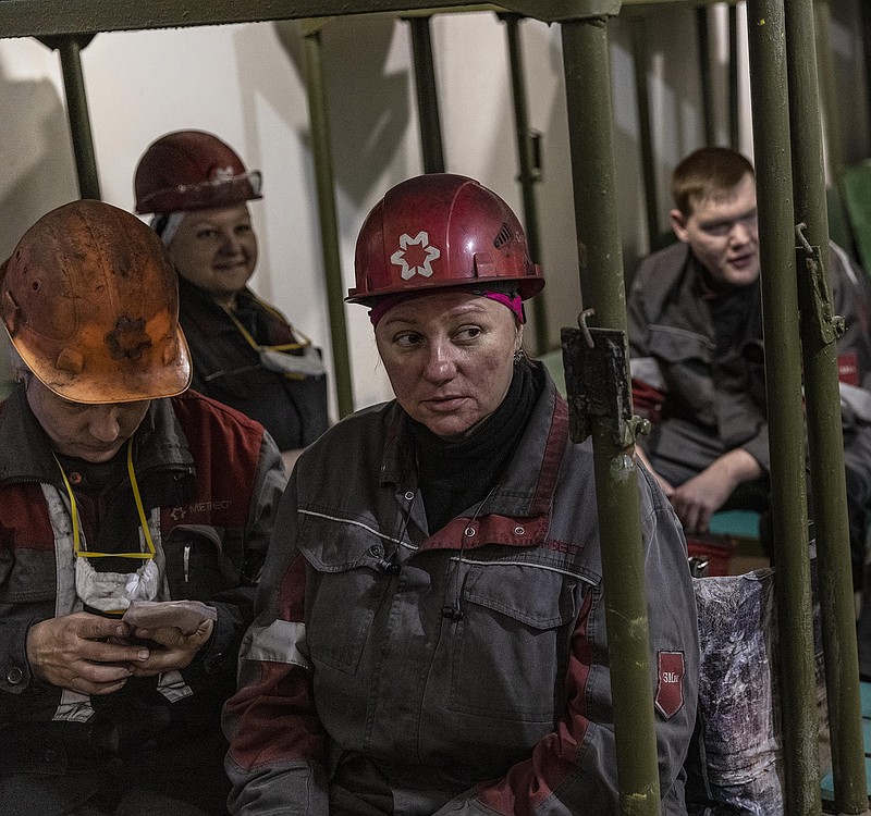 Workers operating an iron ore mine for the Metinvest Group in Kryvyi Rih, Ukraine, take shelter in a bunker Saturday. The company also owns the Azovstal steel plant in Mariupol. More photos at arkansasonline.com/ukrainemonth3/.
(The New York Times/David Guttenfelder)