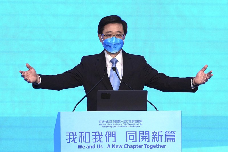 John Lee, former No. 2 official in Hong Kong, and the only candidate for the city's top job, attends his 2022 chief executive electoral campaign rally in Hong Kong on Friday.
(AP/Kin Cheung)