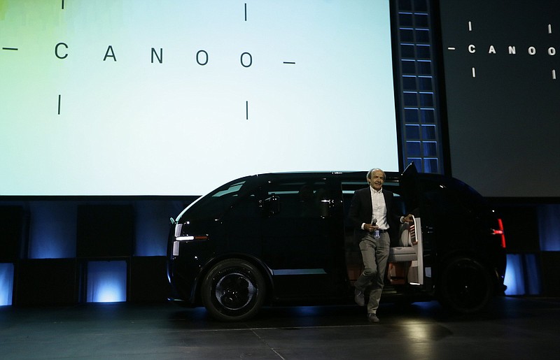 Ulrich Kranz, co-founder & former chief executive officer of Canoo, arrives in his first electric van model at AutoMobility LA auto show in Los Angeles in 2019. Kranz left Canoo in April 2021.
(AP)