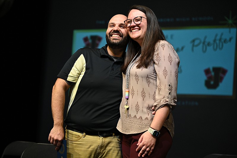 Grant Harbison, the Jonesboro Band Director, and his wife, Leah, react after learning Harbison won the Milken Educator Award for $25,000 during a school assembly at the Academies at Jonesboro High School on Wednesday, May 11, 2022. (Arkansas Democrat-Gazette/Stephen Swofford)