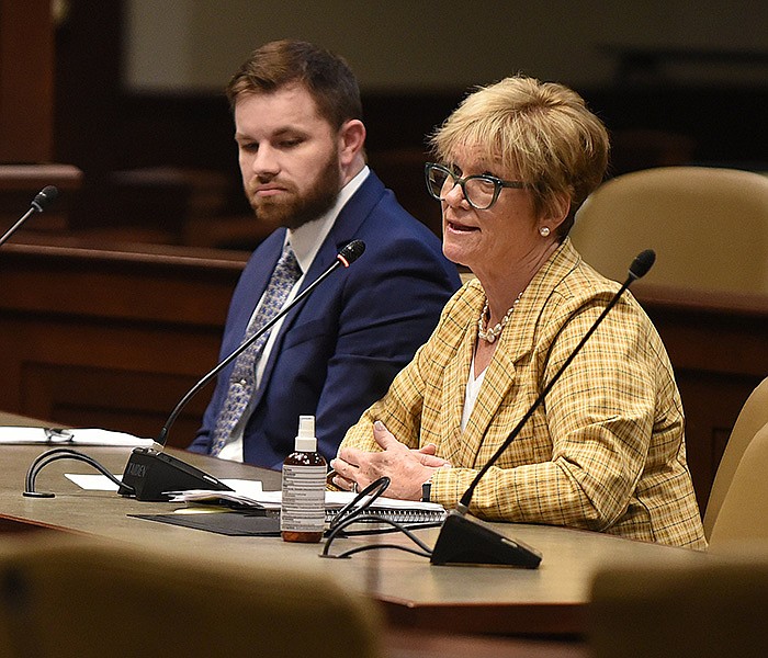 Kay Barnhill (right), director of the Office of State Procurement, and Mitch Rouse, chief general counsel, answer questions Friday during the Legislative Joint Auditing Committee meeting.
(Arkansas Democrat-Gazette/Staci Vandagriff)
