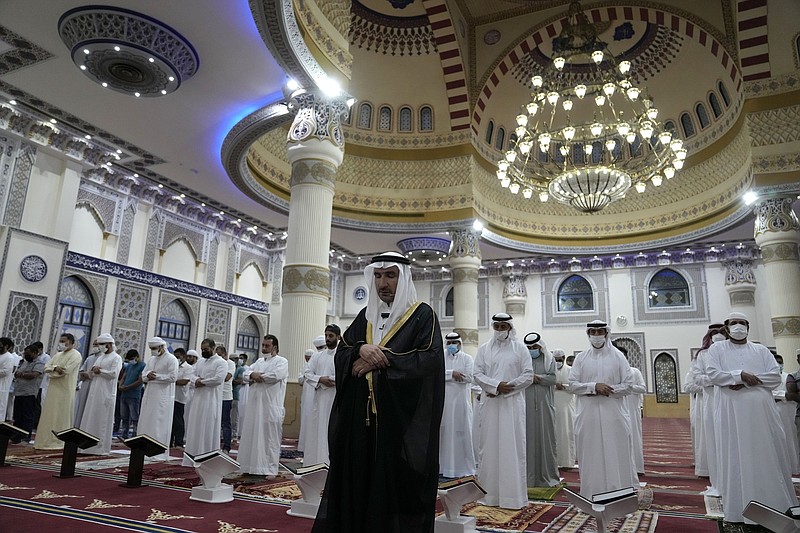The Absentee Prayer is performed Friday in Dubai, United Arab Emirates, after the death of Emirati President Sheikh Khalifa bin Zayed Al Nahyan. More photos at arkansasonline.com/514khalifa/.
(AP/Kamran Jebreili)