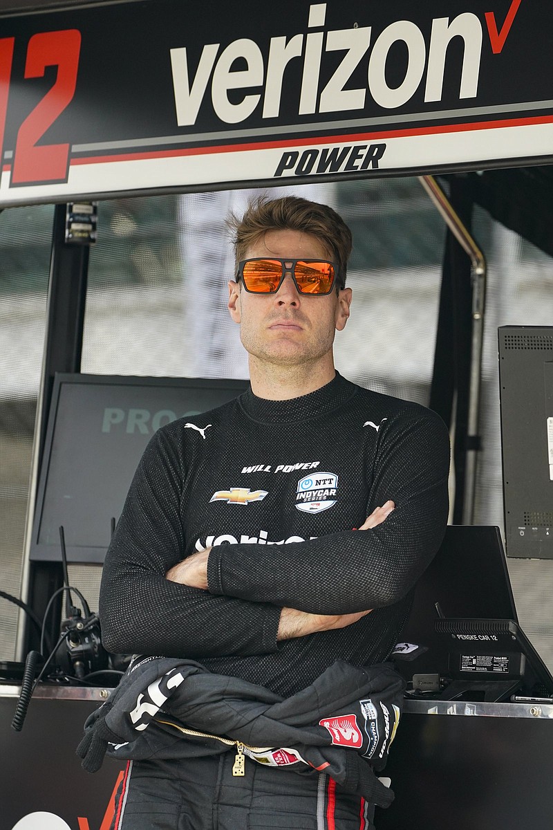 Will Power of Australia waits in the pit area for his car during practice for the Indianapolis 500 auto race at Indianapolis Motor Speedway in Indianapolis, Friday, May 21, 2021. (AP Photo/Michael Conroy)